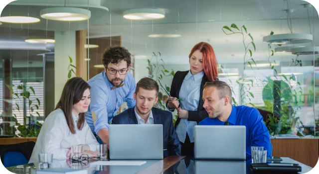 Group of people working together in an office environment